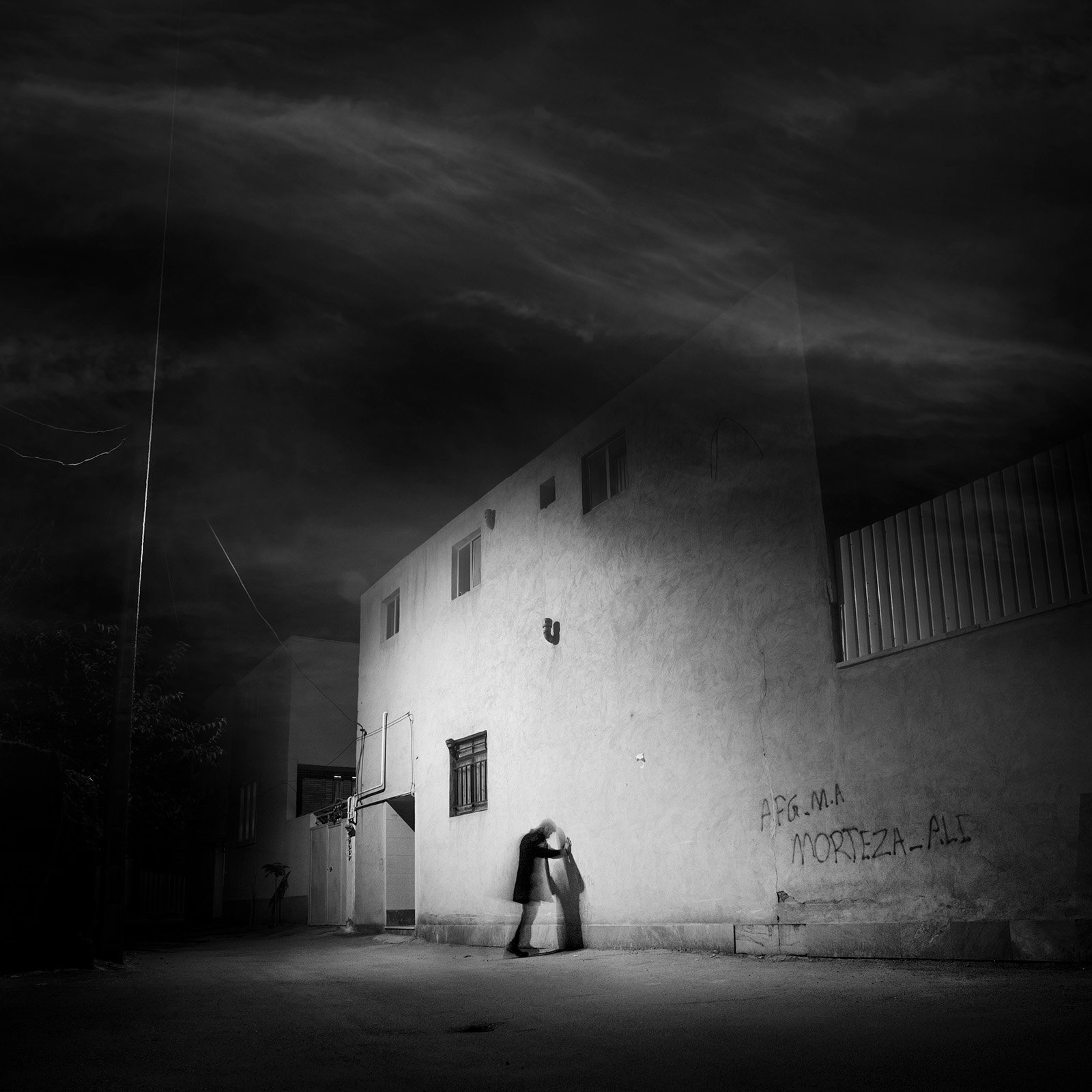 Conceptual photography from the 'Dark Side of the Mind' series, representing the 'dark energy' of the psyche through isolated subjects and infinite black voids.