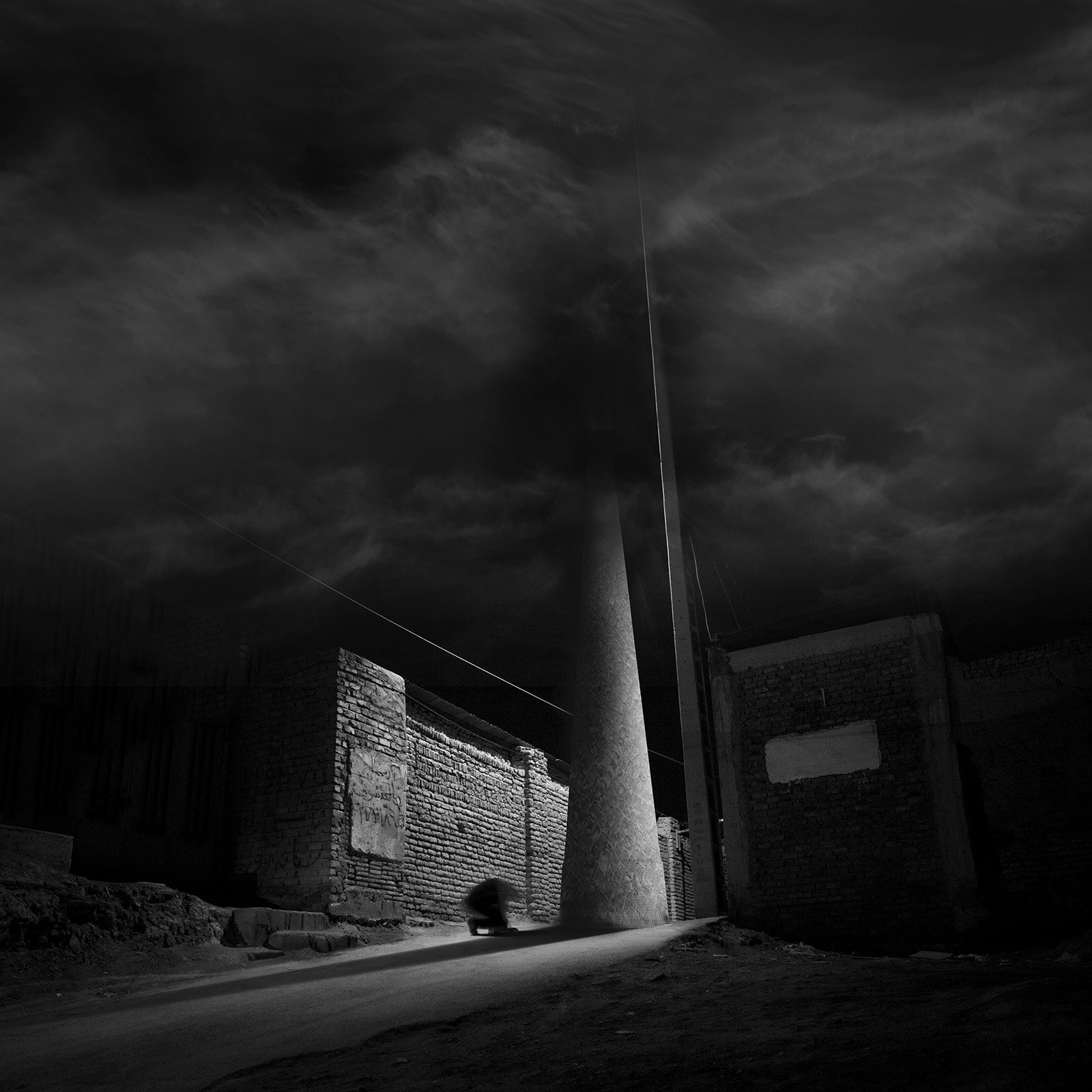 Conceptual photography from the 'Dark Side of the Mind' series, representing the 'dark energy' of the psyche through isolated subjects and infinite black voids.