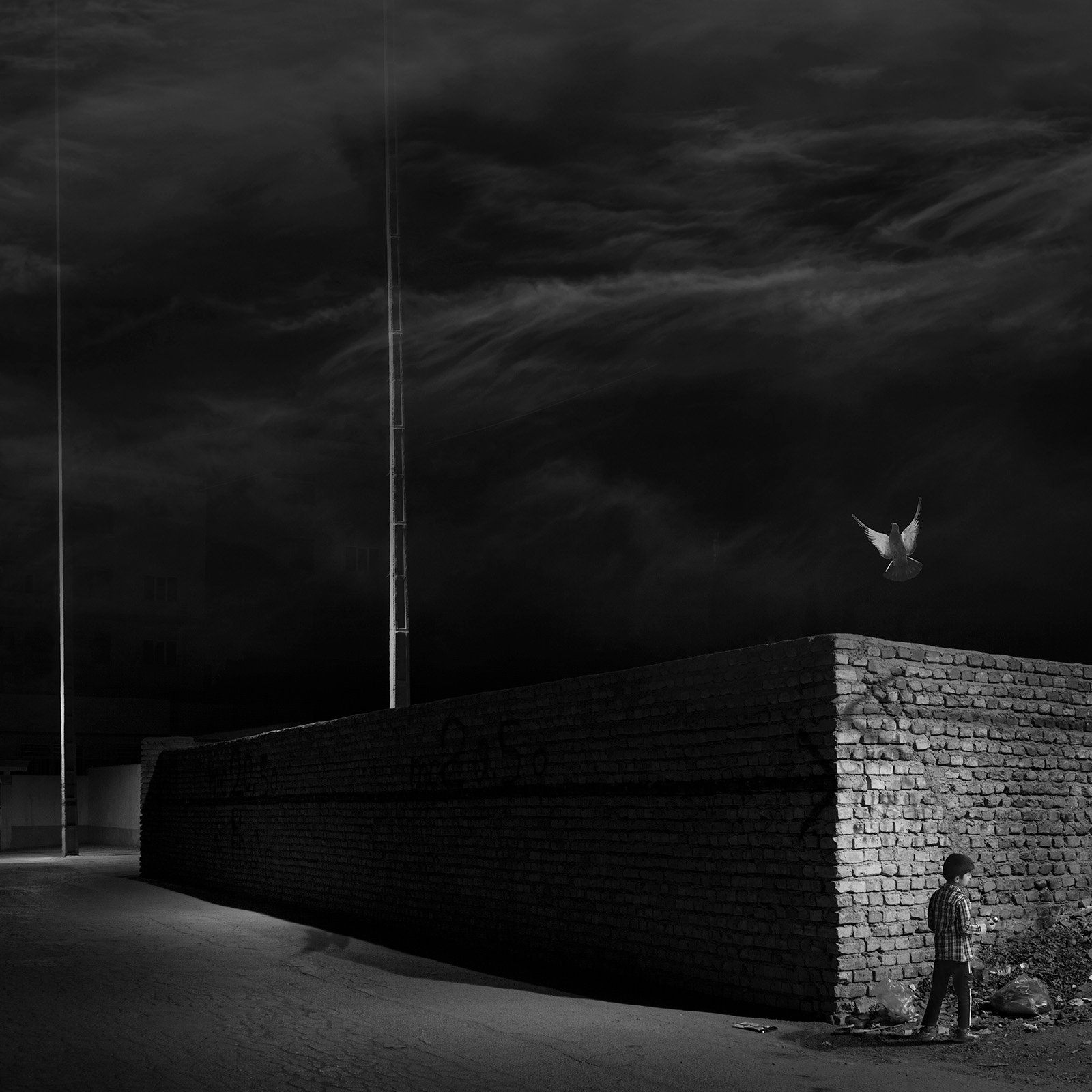 Conceptual photography from the 'Dark Side of the Mind' series, representing the 'dark energy' of the psyche through isolated subjects and infinite black voids.