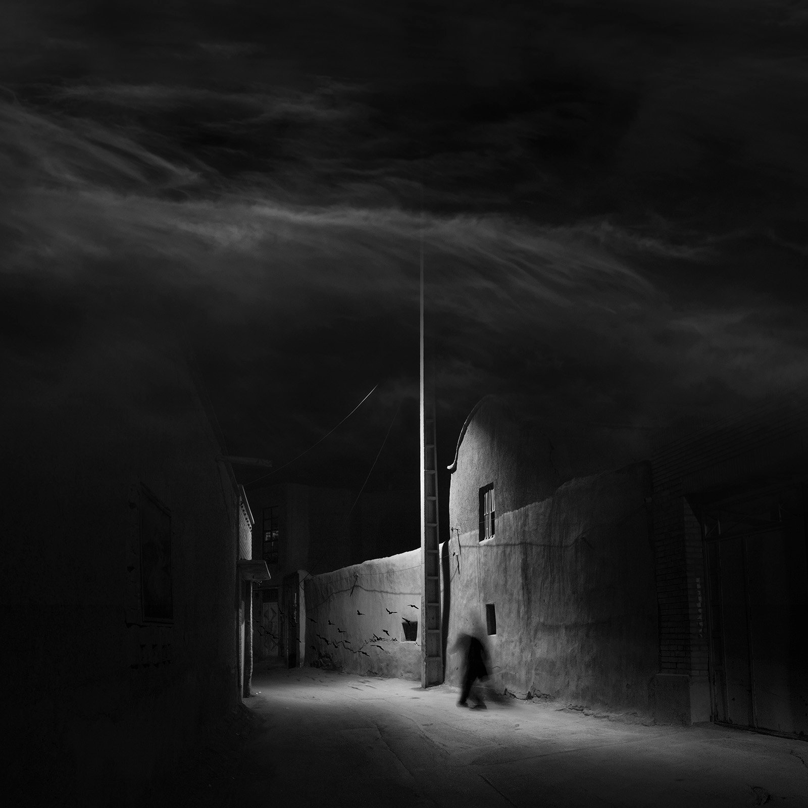 Conceptual photography from the 'Dark Side of the Mind' series, representing the 'dark energy' of the psyche through isolated subjects and infinite black voids.