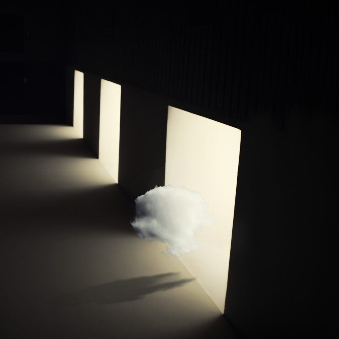 Minimalist fine art photography from the 'Comatose' collection, exploring consciousness through solitary silhouettes, stark shadows, and blinding geometric light.